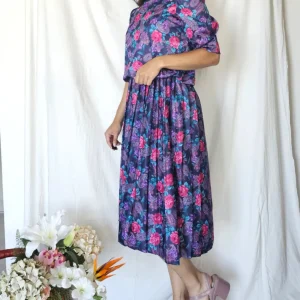 Zwierige 80s vintage jurk met lichte glans | M